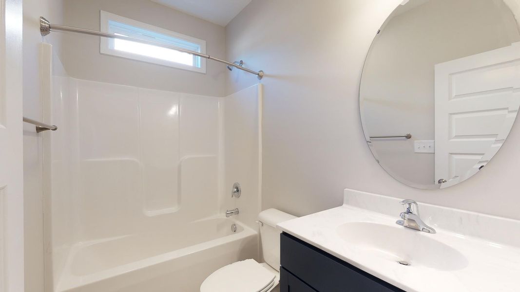 Representative furnished interior of a home built from the Westin A by JC Jackson Homes,LLC in Heritage Pointe, Newport (Image 9).