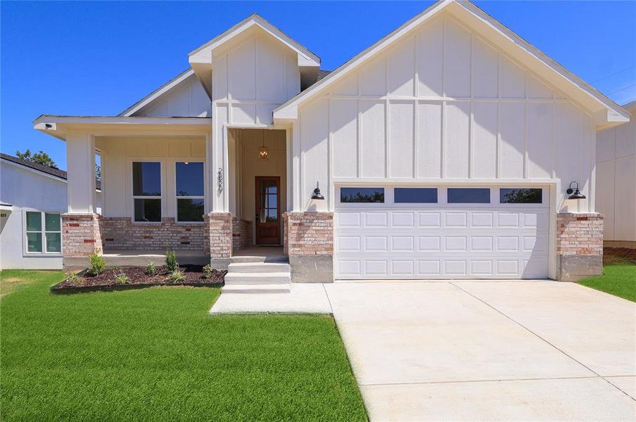 Front exterior of a new home in , Fort Worth, TX, highlighting curb appeal (Image 1). Front exterior of a new home in , Fort Worth, TX, highlighting curb appeal (Image 1).