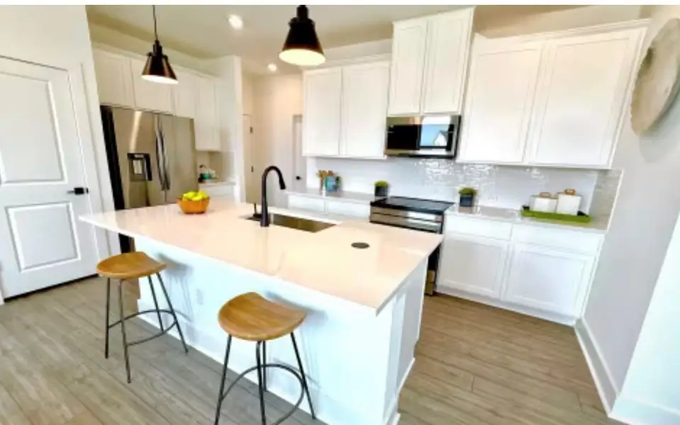 Furnished interior view inside a new home in Avery Centre, Round Rock (Image 6).