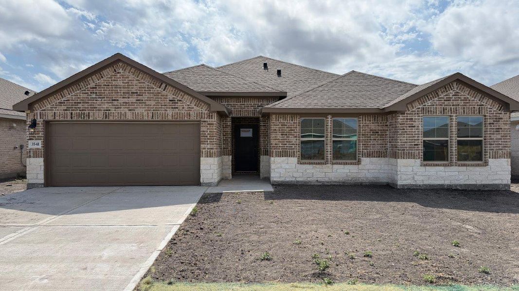 Front exterior of a new home in The Lakes Northwest, Corpus Christi, TX, highlighting curb appeal (Image 2). Front exterior of a new home in The Lakes Northwest, Corpus Christi, TX, highlighting curb appeal (Image 2).