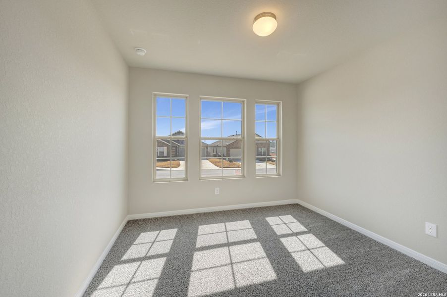 Spacious, unfurnished interior of a new home in Hunters Ranch, San Antonio (Image 14).