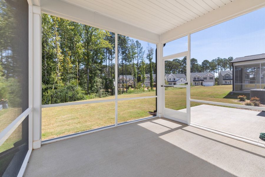Exterior details and patio area of a home in Wimberly, Willow Spring (Image 4).