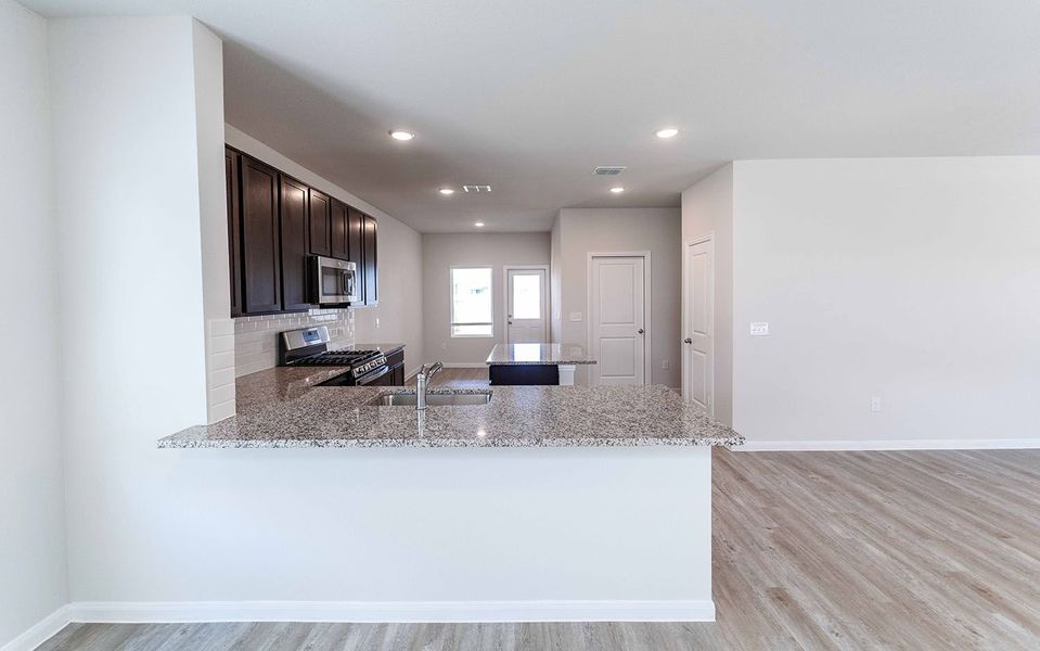 Furnished interior view inside a new home in Paramount, Kyle (Image 5). Furnished interior view inside a new home in Paramount, Kyle (Image 5).