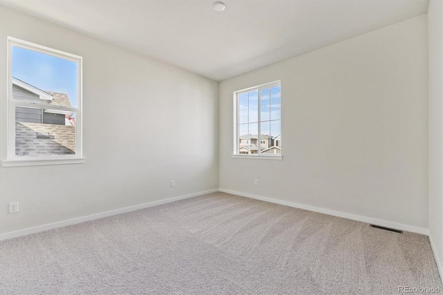 Spacious, unfurnished interior of a new home in Floret Collection at Parkdale Commons, Lafayette (Image 18).