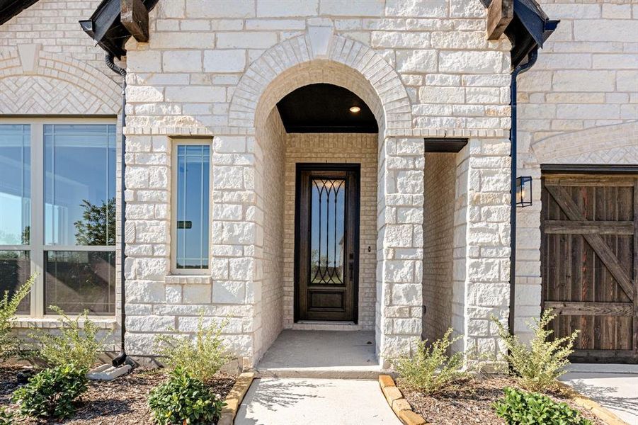 Exterior details and patio area of a home in Stone River Glen 60s, Royse City (Image 4). Exterior details and patio area of a home in Stone River Glen 60s, Royse City (Image 4).