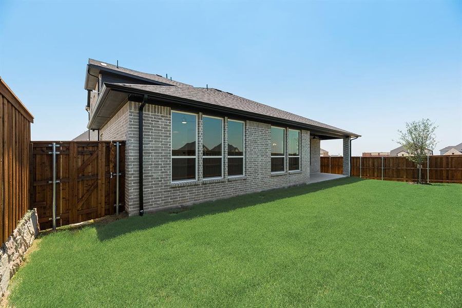 Front exterior of a new home in Hillside Village, Celina, TX, highlighting curb appeal (Image 22).