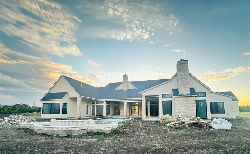 Expansive backyard professionally landscaped for ultimate privacy with more than 1,000 square feet of outdoor living. Custom Modern Design Swimming Pool with Tanning Ledge and Spa, outdoor kitchen, dining area, and multiple living and gathering spaces. Spacious cabana room with vaulted ceilings, stone fireplace, and expansive sliding walls of glass opening directly to the resort-style outdoor living. Expansive backyard professionally landscaped for ultimate privacy with more than 1,000 square feet of outdoor living. Custom Modern Design Swimming Pool with Tanning Ledge and Spa, outdoor kitchen, dining area, and multiple living and gathering spaces. Spacious cabana room with vaulted ceilings, stone fireplace, and expansive sliding walls of glass opening directly to the resort-style outdoor living.