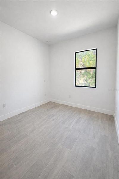Spacious, unfurnished interior of a new home in , Port Charlotte (Image 15).