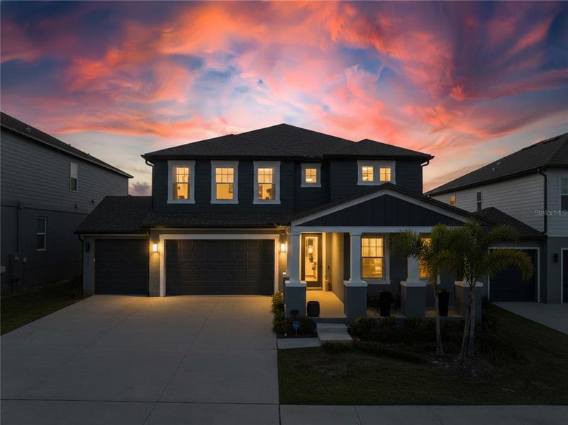 Front exterior of a new home in , Minneola, FL, highlighting curb appeal (Image 26). Front exterior of a new home in , Minneola, FL, highlighting curb appeal (Image 26).