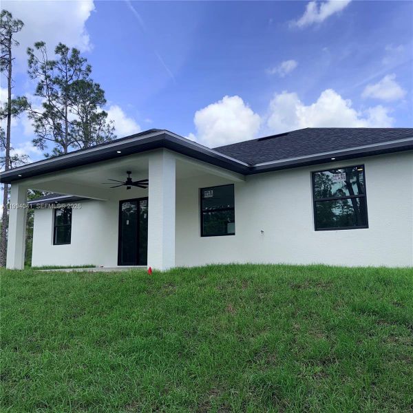 Exterior details and patio area of a home in , Lehigh Acres (Image 3).