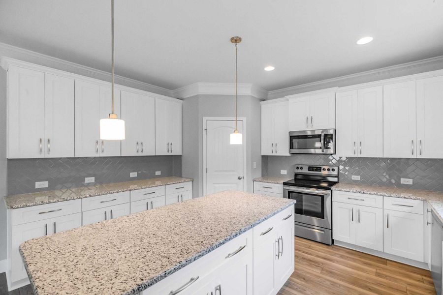 Representative furnished interior of a home built from the Drayton by Caviness & Cates Communities in Bartlett Manor, Youngsville (Image 170).