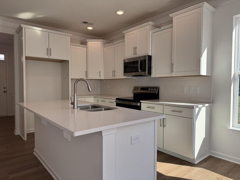 Furnished interior view inside a new home in East Main Townes, Spartanburg (Image 5).