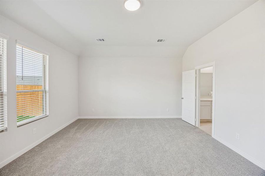 Primary Suite in the Stanley II home plan by Trophy Signature Homes – REPRESENTATIVE PHOTO