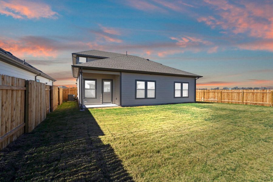 Rear of Home and Private Backyard