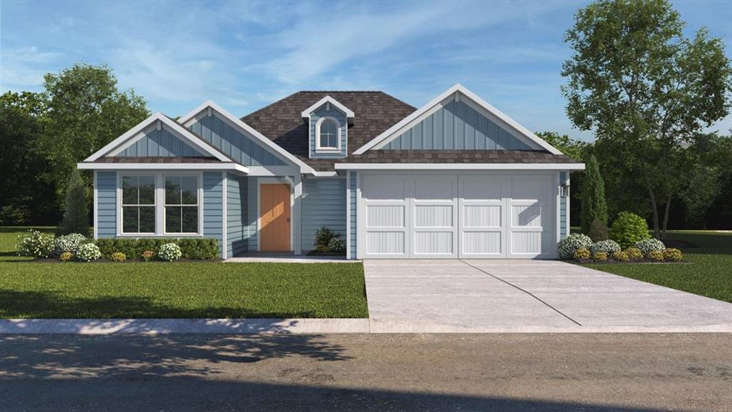 View of front of property with a garage and a front lawn