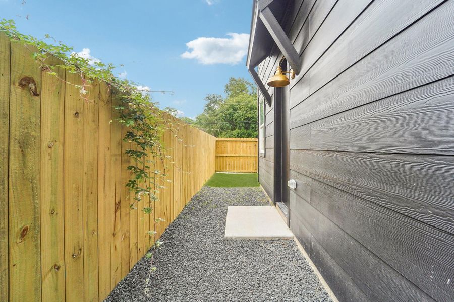 Exterior details and patio area of a home in , Houston (Image 4).