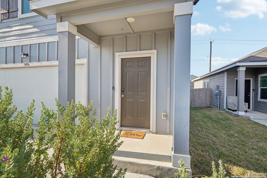 Front exterior of a new home in Sutton Farms, San Antonio, TX, highlighting curb appeal (Image 23). Front exterior of a new home in Sutton Farms, San Antonio, TX, highlighting curb appeal (Image 23).