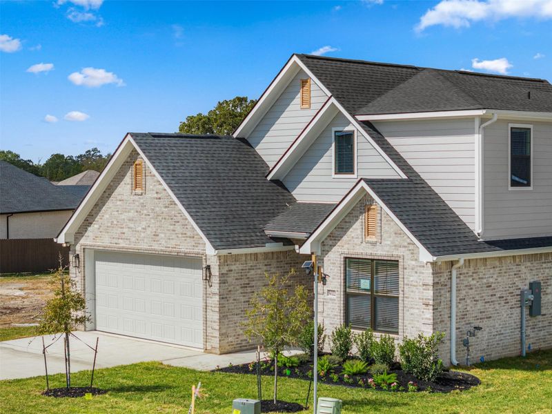 Front exterior of a new home in , Bryan, TX, highlighting curb appeal (Image 2). Front exterior of a new home in , Bryan, TX, highlighting curb appeal (Image 2).