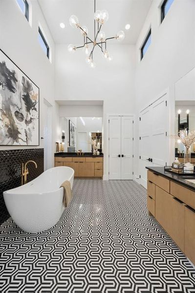 Dramatic two story ceilings in the primary bath Dramatic two story ceilings in the primary bath