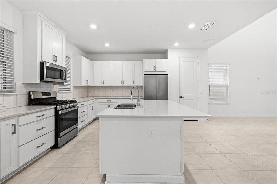 Furnished interior view inside a new home in Harvest At Ovation 50s, Winter Garden (Image 7).