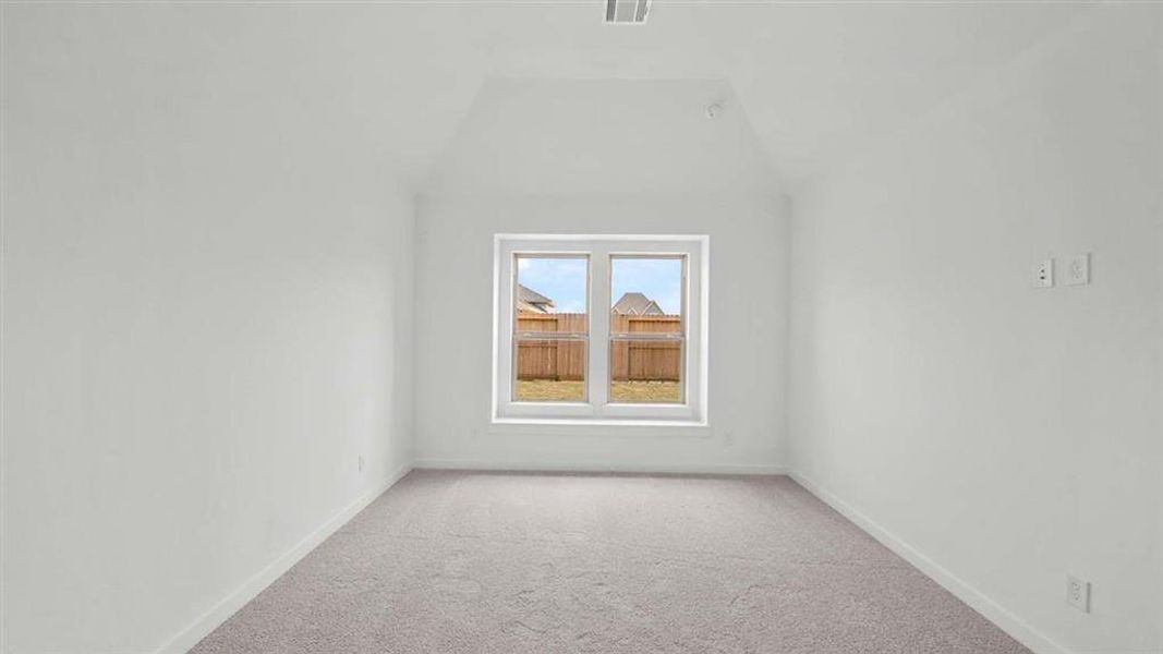 Primary Bedroom with raised ceiling