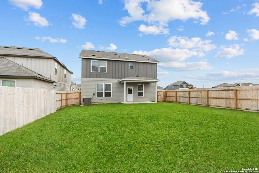 Front exterior of a new home in Lily Springs, Seguin, TX, highlighting curb appeal (Image 2). Front exterior of a new home in Lily Springs, Seguin, TX, highlighting curb appeal (Image 2).