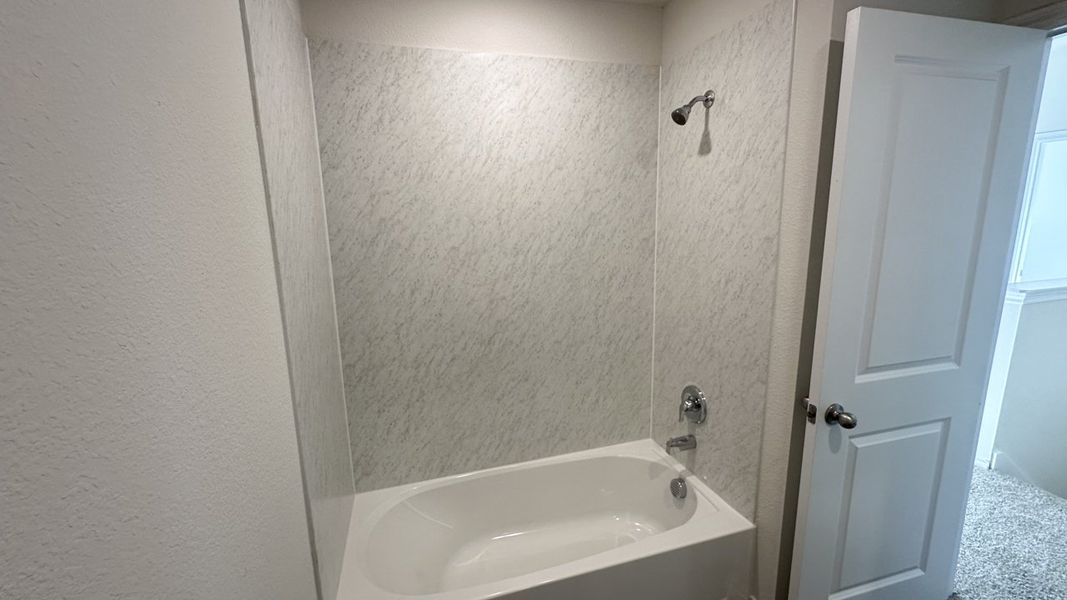 Representative furnished interior of a home built from the HANNA by D.R. Horton in Northspur, Forney (Image 12).