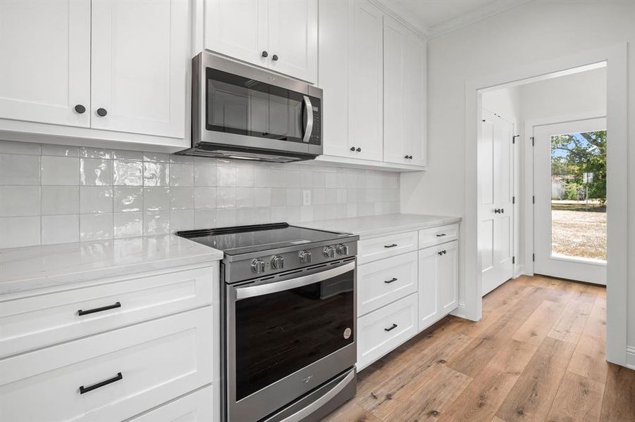 Furnished interior view inside a new home in , Sulphur Springs (Image 6). Furnished interior view inside a new home in , Sulphur Springs (Image 6).