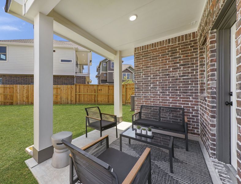 Exterior details and patio area of a home in Elyson, Katy (Image 4). Exterior details and patio area of a home in Elyson, Katy (Image 4).