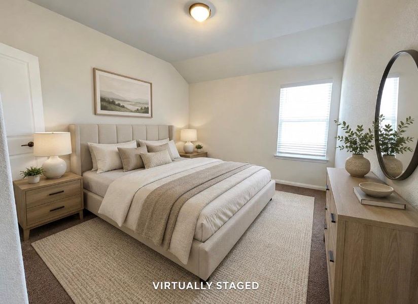 Upstairs bedroom. Relaxation awaits in this neutral-toned bedroom, featuring plush carpeting and a bright window.