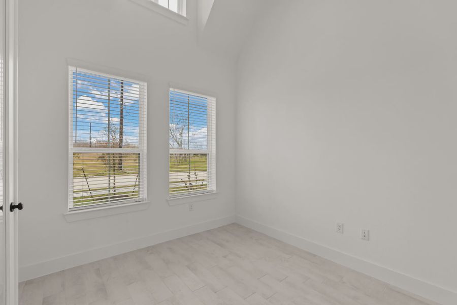 Representative unfurnished interior of a home built from the Sorenstam by Chesmar Homes in Riceland Alley Loads, Mont Belvieu (Image 65).