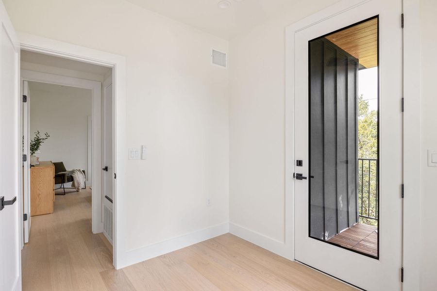Entryway featuring light wood-style flooring Entryway featuring light wood-style flooring