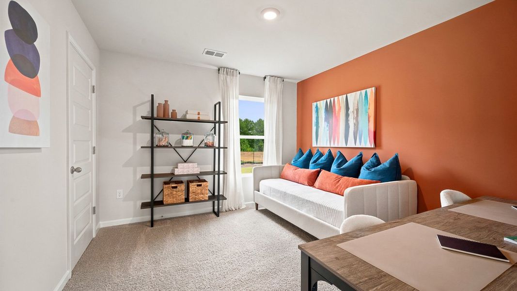Representative furnished interior of a home built from the HAYDEN Express by D.R. Horton in Teamon Pointe, Griffin (Image 25).