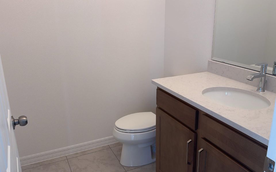 Modern Bathroom with Stylish Fixtures in Central Florida Home