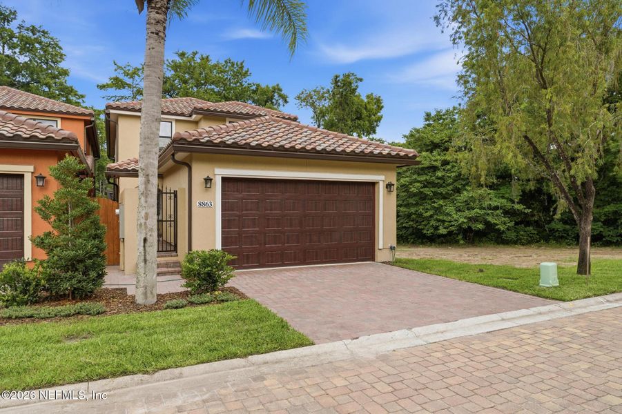 Front exterior of a new home in , Jacksonville, FL, highlighting curb appeal (Image 26). Front exterior of a new home in , Jacksonville, FL, highlighting curb appeal (Image 26).