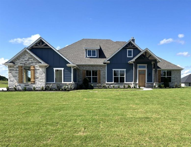 Front exterior of a new home in Hidden Creek Estates, Van Alstyne, TX, highlighting curb appeal (Image 2). Front exterior of a new home in Hidden Creek Estates, Van Alstyne, TX, highlighting curb appeal (Image 2).