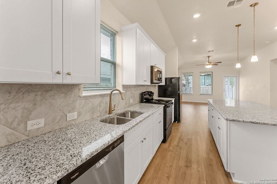 Furnished interior view inside a new home in Bricewood, San Antonio (Image 8).