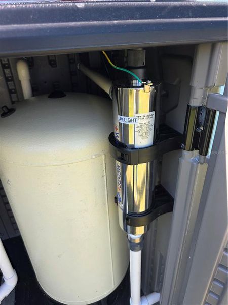 Exterior details and patio area of a home in , North Port (Image 33).