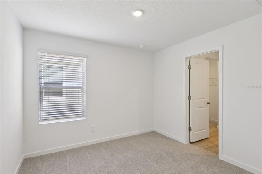 Spacious, unfurnished interior of a new home in Colbert Landings, Palm Coast (Image 23).
