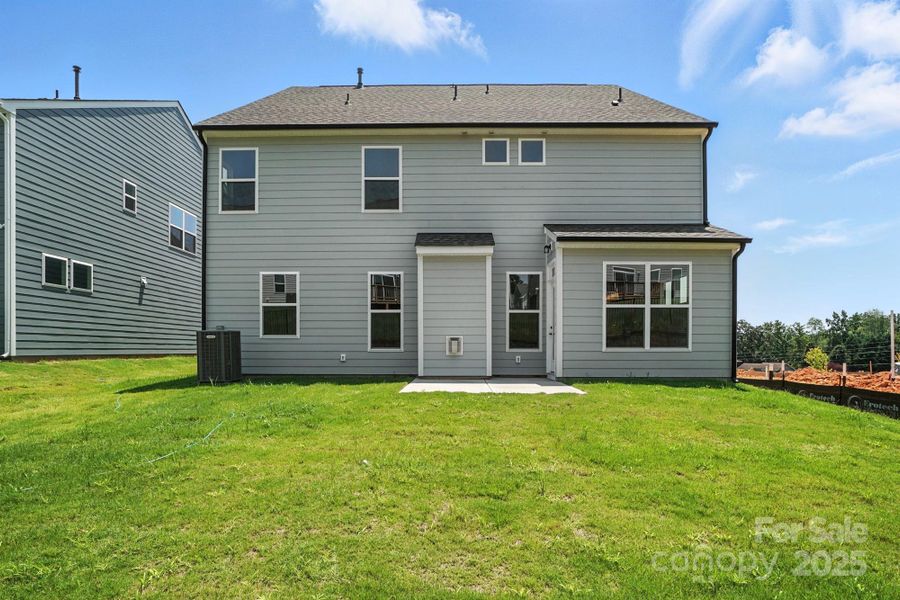 Front exterior of a new home in Summerlin, Mooresville, NC, highlighting curb appeal (Image 23). Front exterior of a new home in Summerlin, Mooresville, NC, highlighting curb appeal (Image 23).