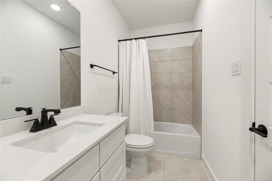 Furnished interior view inside a new home in Bridgeland, Cypress (Image 39).