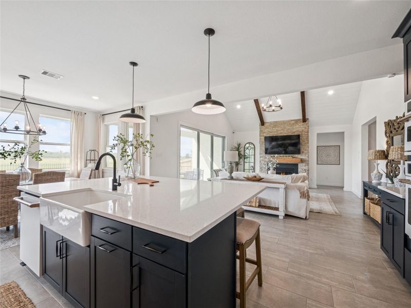 Kitchen overlooks the great room (*Photo not of actual home and used for illustration purposes only.)