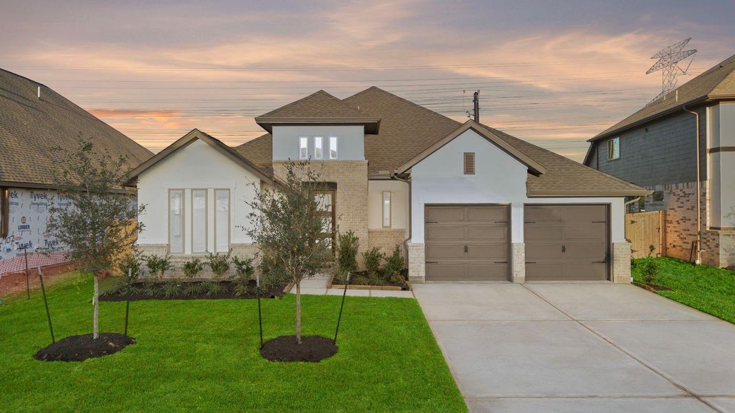 Front exterior of a new home in Coastal Point, League City, TX, highlighting curb appeal (Image 20).