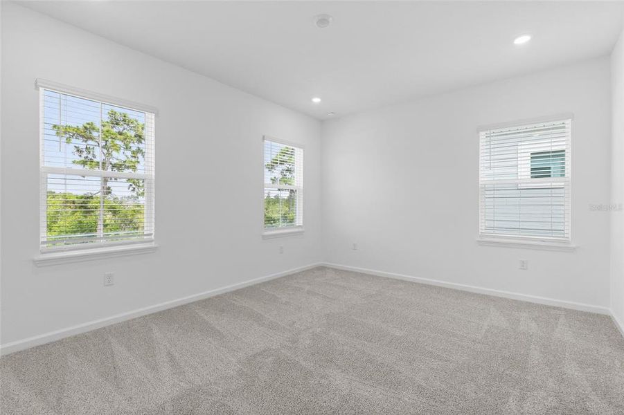 Spacious, unfurnished interior of a new home in Serenade at Ovation, Winter Garden (Image 32). Spacious, unfurnished interior of a new home in Serenade at Ovation, Winter Garden (Image 32).