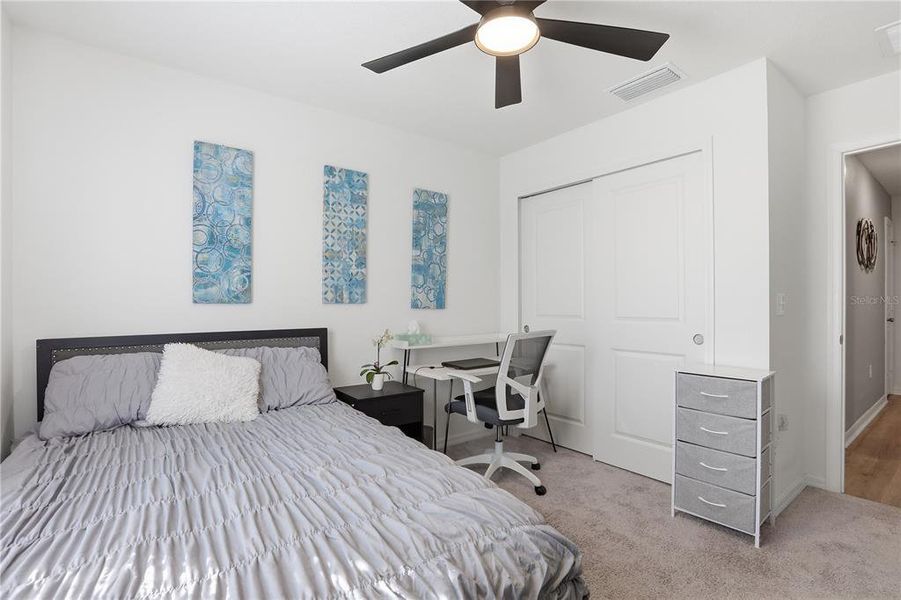 Furnished interior view inside a new home in Bellaviva I at Westside, Davenport (Image 30).