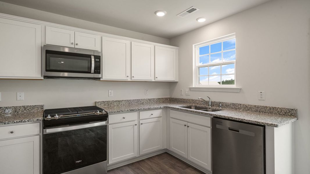 Furnished interior view inside a new home in Faircrest, Greensboro (Image 5). Furnished interior view inside a new home in Faircrest, Greensboro (Image 5).