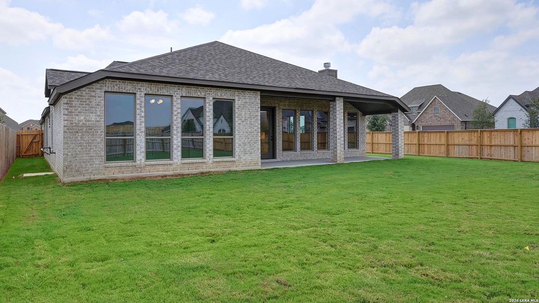 Exterior details and patio area of a home in Alsatian Oaks, Castroville (Image 25).