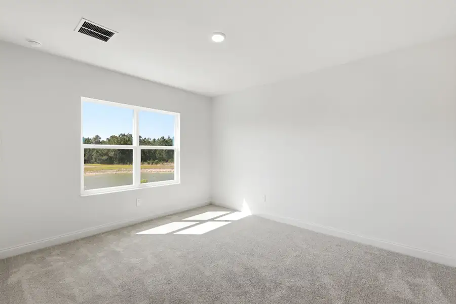 Spacious, unfurnished interior of a new home in Tamarack at Two Rivers, Zephyrhills (Image 19).