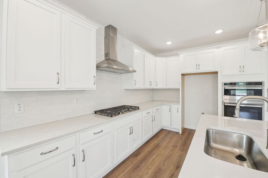 Representative furnished interior of a home built from the Alexis by Ashton Woods in Rowland's Grant, Fuquay Varina (Image 12).