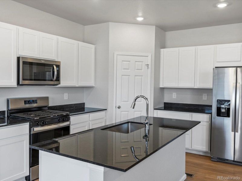 Furnished interior view inside a new home in Lake Bluff, Greeley (Image 11).